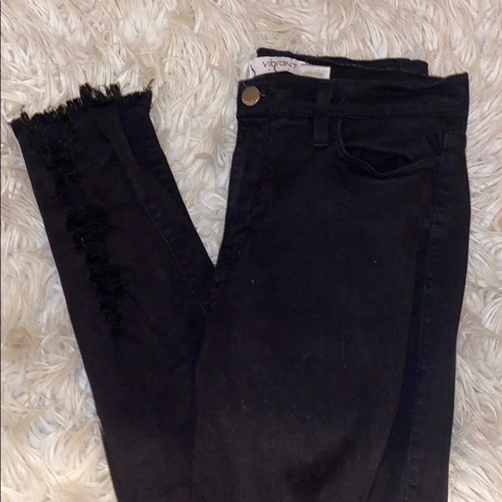 Vibrant Black Skinny Jeans With Tears